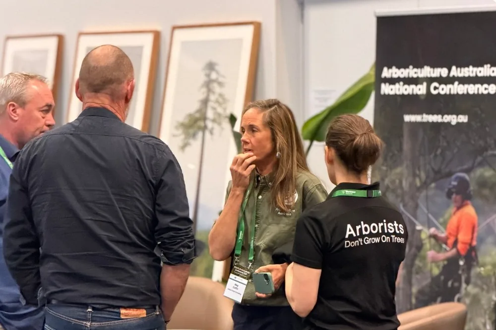 Arborists talking at the ArboStar stand at the Arboriculture Australia National Conference 2026 in Hobart